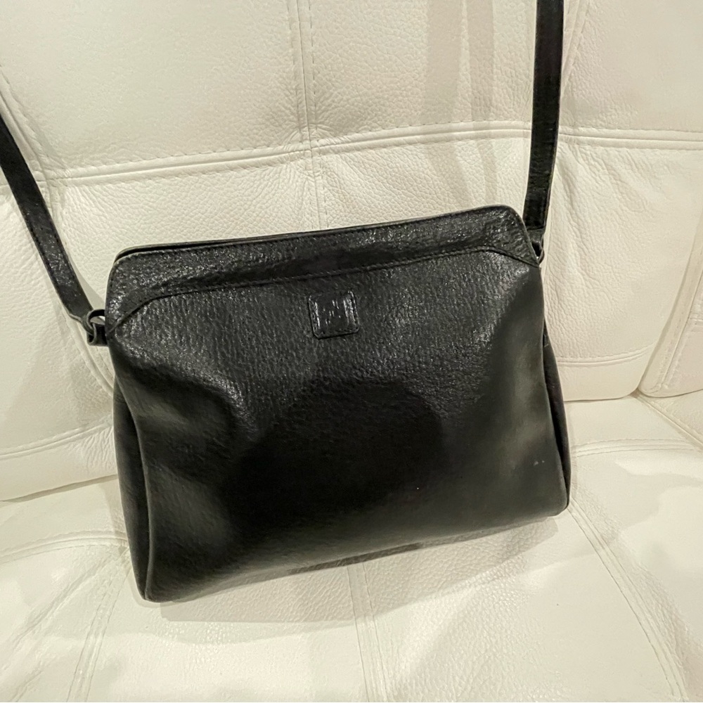 Authentic vintage Fendi leather handbag. Crossbody or use adjustable strap.